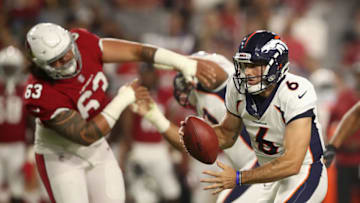GLENDALE, AZ - AUGUST 30: Quarterback Chad Kelly #6 of the Denver Broncos looks to pass under pressure from defensive tackle Peli Anau #63 of the Arizona Cardinals during the preseason NFL game at University of Phoenix Stadium on August 30, 2018 in Glendale, Arizona. (Photo by Christian Petersen/Getty Images)