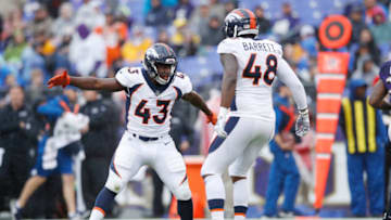 BALTIMORE, MD - SEPTEMBER 23: Joe Jones #43 and Shaquil Barrett #48 of the Denver Broncos react after a blocked punt in the first quarter of the game against the Baltimore Ravens at M&T Bank Stadium on September 23, 2018 in Baltimore, Maryland. (Photo by Joe Robbins/Getty Images)