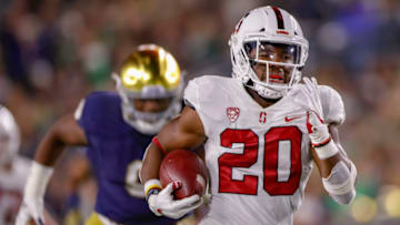 SOUTH BEND, IN - SEPTEMBER 29: Bryce Love #20 of the Stanford Cardinal runs for a touchdown during the game against the Notre Dame Fighting Irish at Notre Dame Stadium on September 29, 2018 in South Bend, Indiana. (Photo by Michael Hickey/Getty Images)