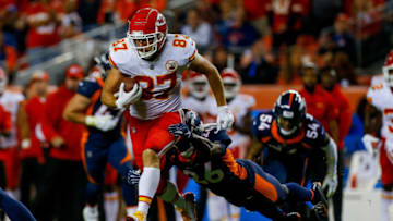 DENVER, CO - OCTOBER 1: Tight end Travis Kelce #87 of the Kansas City Chiefs runs the ball against defensive back Darian Stewart #26 of the Denver Broncos in the fourth quarter of a game at Broncos Stadium at Mile High on October 1, 2018 in Denver, Colorado. (Photo by Justin Edmonds/Getty Images)
