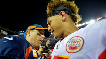 DENVER, CO - OCTOBER 1: Quarterback Case Keenum #4 of the Denver Broncos and quarterback Patrick Mahomes #15 of the Kansas City Chiefs shake hands after a 27-23 Chiefs win at Broncos Stadium at Mile High on October 1, 2018 in Denver, Colorado. (Photo by Dustin Bradford/Getty Images)