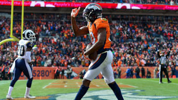 DENVER, CO - OCTOBER 14: Wide receiver Emmanuel Sanders #10 of the Denver Broncos celebrates after a catch before drawing a taunting penalty in the first quarter of a game against the Los Angeles Rams at Broncos Stadium at Mile High on October 14, 2018 in Denver, Colorado. (Photo by Dustin Bradford/Getty Images)