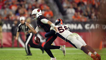 GLENDALE, AZ - OCTOBER 18: Linebacker Von Miller #58 of the Denver Broncos knocks the ball away from quarterback Josh Rosen #3 of the Arizona Cardinals during the third quarter at State Farm Stadium on October 18, 2018 in Glendale, Arizona. The fumble was overturned after a video replay. (Photo by Christian Petersen/Getty Images)