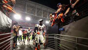 GLENDALE, AZ - OCTOBER 18: Linebacker Von Miller #58 of the Denver Broncos runs past fans as he leaves the field following the NFL game against the Arizona Cardinals at State Farm Stadium on October 18, 2018 in Glendale, Arizona. The Broncoes defeated the Cardinals 45-10. (Photo by Christian Petersen/Getty Images)