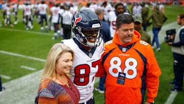 DENVER, CO - NOVEMBER 4: Wide receiver Demaryius Thomas #87 of the Houston Texans takes a photo with fans, including one wearing his former Denver Broncos jersey, during warm ups before a game against the Broncos at Broncos Stadium at Mile High on November 4, 2018 in Denver, Colorado. (Photo by Justin Edmonds/Getty Images)