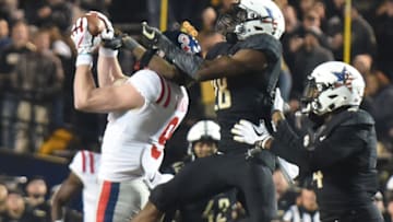 NASHVILLE, TN - NOVEMBER 17: Dawson Knox #9 of the Ole Miss Rebels makes a catch while being defended by Allan George #28 of the Vanderbilt Commodores during the second half at Vanderbilt Stadium on November 17, 2018 in Nashville, Tennessee. (Photo by Frederick Breedon/Getty Images)