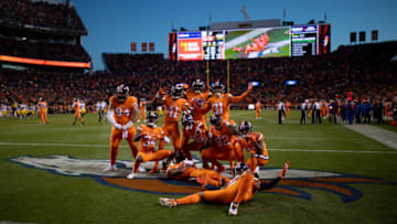 DENVER, CO - NOVEMBER 25: Denver Broncos defensive players celebrate in the end zone after a fumble recovery by strong safety Darian Stewart #26 in the third quarter of a game against the Pittsburgh Steelers at Broncos Stadium at Mile High on November 25, 2018 in Denver, Colorado. (Photo by Justin Edmonds/Getty Images)
