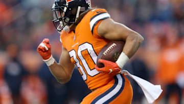 DENVER, CO - NOVEMBER 25: Phillip Lindsay #30 of the Denver Broncos carries the ball against the Pittsburgh Steelers at Broncos Stadium at Mile High on November 25, 2018 in Denver, Colorado. (Photo by Matthew Stockman/Getty Images)