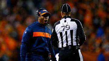 DENVER, CO - DECEMBER 15: Head coach Vance Joseph of the Denver Broncos has a word with head linesman Kent Payne #79 in the second quarter of a game against the Cleveland Browns at Broncos Stadium at Mile High on December 15, 2018 in Denver, Colorado. (Photo by Justin Edmonds/Getty Images)
