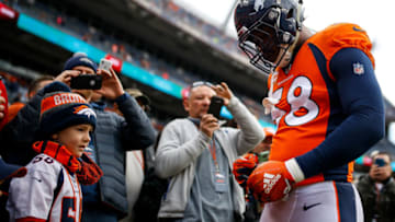 DENVER, CO - DECEMBER 30: Outside linebacker Von Miller #58 of the Denver Broncos signs autographs for fans before a game against the Los Angeles Chargers at Broncos Stadium at Mile High on December 30, 2018 in Denver, Colorado. (Photo by Justin Edmonds/Getty Images)