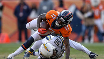 DENVER, CO - DECEMBER 30: Wide receiver DaeSean Hamilton #17 of the Denver Broncos is tripped up by linebacker Hayes Pullard #50 of the Los Angeles Chargers in the second quarter of a game at Broncos Stadium at Mile High on December 30, 2018 in Denver, Colorado. (Photo by Matthew Stockman/Getty Images)