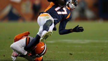 DENVER, COLORADO - DECEMBER 15: Briean Boddy-Calhoun #20 of the Cleveland Browns tackles DaeSean Hamilton #17 of the Denver Broncos at Broncos Stadium at Mile High on December 15, 2018 in Denver, Colorado. (Photo by Matthew Stockman/Getty Images)