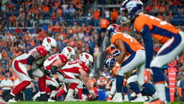 DENVER, CO - AUGUST 29: The Arizona Cardinals offense lines up behind Siupeli Anau #60 during the third quarter of a preseason National Football League game against the Denver Broncos at Broncos Stadium at Mile High on August 29, 2019 in Denver, Colorado. (Photo by Dustin Bradford/Getty Images)