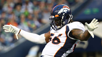 SEATTLE, WASHINGTON - AUGUST 08: Dekoda Watson #56 of the Denver Broncos celebrates after sacking Geno Smith #7 of the Seattle Seahawks in the second quarter during their preseason game at CenturyLink Field on August 08, 2019 in Seattle, Washington. (Photo by Abbie Parr/Getty Images)