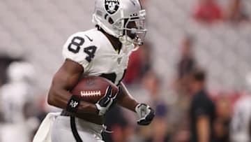 GLENDALE, ARIZONA - AUGUST 15: Wide receiver Antonio Brown #84 of the Oakland Raiders warms up before the NFL preseason game against the Arizona Cardinals at State Farm Stadium on August 15, 2019 in Glendale, Arizona. (Photo by Christian Petersen/Getty Images)