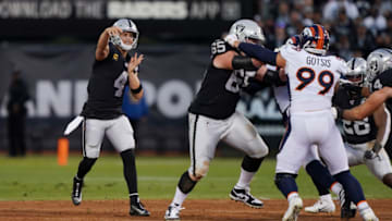 OAKLAND, CALIFORNIA - SEPTEMBER 09: Quarterback Derek Carr #4 of the Oakland Raiders passes against the Denver Broncos in the first quarter of the game at RingCentral Coliseum on September 09, 2019 in Oakland, California. (Photo by Thearon W. Henderson/Getty Images)