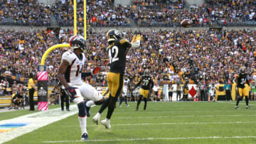 PITTSBURGH, PENNSYLVANIA - OCTOBER 10: James Pierre #42 of the Pittsburgh Steelers intercepts a pass during the fourth quarter against the Denver Broncos at Heinz Field on October 10, 2021 in Pittsburgh, Pennsylvania. (Photo by Justin K. Aller/Getty Images)