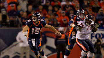 DENVER, CO - DECEMBER 11: Quarterback Tim Tebow #15 of the Denver Broncos throws the ball against the Chicago Bears at Sports Authority Field at Mile High on December 11, 2011 in Denver, Colorado. (Photo by Justin Edmonds/Getty Images)