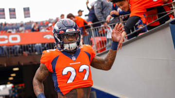 DENVER, COLORADO - OCTOBER 23: Kareem Jackson #22 of the Denver Broncos high fives fans before the game against the New York Jets at Empower Field At Mile High on October 23, 2022 in Denver, Colorado. (Photo by Justin Edmonds/Getty Images)