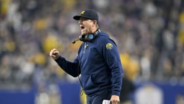 GLENDALE, ARIZONA - DECEMBER 31: Head coach Jim Harbaugh of the Michigan Wolverines gestures during the third quarter of the College Football Playoff Semifinal Fiesta Bowl football game against the TCU Horned Frogs at State Farm Stadium on December 31, 2022 in Glendale, Arizona. The TCU Horned Frogs won 51-45. (Photo by Alika Jenner/Getty Images)