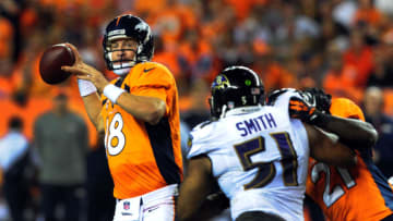 DENVER, CO - SEPTEMBER 5: Peyton Manning #18 of the Denver Broncos drops back to pass during the third quarter of the game against the Baltimore Ravens at Sports Authority Field at Mile High on September 5, 2013 in Denver, Colorado. (Photo by Steve Dykes/Getty Images)