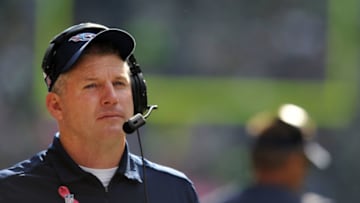 SEATTLE, WA. - OCTOBER 13: Head coach Mike Munchak of the Tennessee Titans looks on from the bench during the fourth quarter of the game against the Seattle Seahawks at CenturyLink Field on October 13, 2013 in Seattle, Washington. Seattle won the game 20-13. (Photo by Steve Dykes/Getty Images)