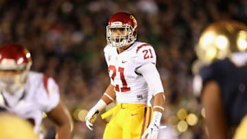 SOUTH BEND, IN - OCTOBER 19: Su'a Cravens #21 of the University of Southern California Trojans awaits the snap against the Notre Dame Fighting Irish at Notre Dame Stadium on October 19, 2013 in South Bend, Indiana. Notre Dame defeated USC 14-10. (Photo by Jonathan Daniel/Getty Images)