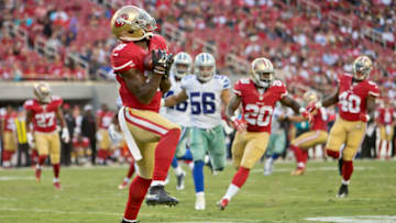 SANTA CLARA, CA - AUGUST 23: DeAndrew White #18 of the San Francisco 49ers pulls in a punt for a fair catch against the Dallas Cowboys in the third quarter of a preseason game on August 23, 2015 at Levi's Stadium in Santa Clara, California. The 49ers won 23-6. (Photo by Brian Bahr/Getty Images)