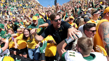 IOWA CITY, IOWA- SEPTEMBER 17: Fans celebrate with cornerback Darren Kelley #11 of the North Dakota State Bisons after the upset over the Iowa Hawkeyes on September 17, 2016 at Kinnick Stadium in Iowa City, Iowa. (Photo by Matthew Holst/Getty Images)