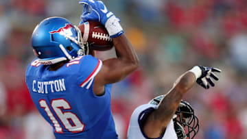 DALLAS, TX - SEPTEMBER 23: Courtland Sutton #16 of the Southern Methodist Mustangs pulls in a pass against Tony James #28 of the TCU Horned Frogs in the first quarter at Gerald J. Ford Stadium on September 23, 2016 in Dallas, Texas. (Photo by Tom Pennington/Getty Images)