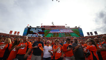 DENVER, CO - OCTOBER 30: Fans cheer as jets fly over the stadium during the National Anthem at Sports Authority Field at Mile High on October 30, 2016 in Denver, Colorado. (Photo by Justin Edmonds/Getty Images)