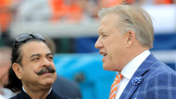 JACKSONVILLE, FL - DECEMBER 04: Jacksonville Jaguars owner Shahid Khan, left, talks with Denver Broncos GM John Elway before the game at EverBank Field on December 4, 2016 in Jacksonville, Florida. (Photo by Sam Greenwood/Getty Images)