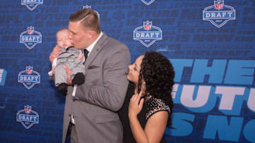 PHILADELPHIA, PA - APRIL 27: Garett Bolles of Utah pose for a picture with his wife Natalie Bolles and child on the red carpet prior to the start of the 2017 NFL Draft on April 27, 2017 in Philadelphia, Pennsylvania. (Photo by Mitchell Leff/Getty Images)