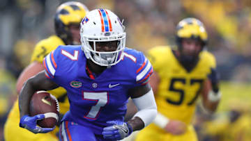ARLINGTON, TX - SEPTEMBER 02: Duke Dawson #7 of the Florida Gators carries the ball on a touchdown run after an interception against the Michigan Wolverines in the second quarter of a game at AT&T Stadium on September 2, 2017 in Arlington, Texas. (Photo by Tom Pennington/Getty Images)