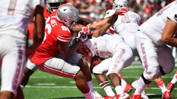 COLUMBUS, OH - SEPTEMBER 23: Dre'Mont Jones #86 of the Ohio State Buckeyes tackles Lexington Thomas of the UNLV Rebels in the end zone for a safety in the first quarter at Ohio Stadium on September 23, 2017 in Columbus, Ohio. (Photo by Jamie Sabau/Getty Images)