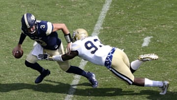 ATLANTA, GA - SEPTEMBER 23: Defensive end Antonio Simmons #93 of the Georgia Tech Yellow Jackets sacks quarterback Ben Dinucci #3 of the Pittsburgh Panthers in the second half during the game at Bobby Dodd Stadium on September 23, 2017 in Atlanta, Georgia. (Photo by Mike Zarrilli/Getty Images)