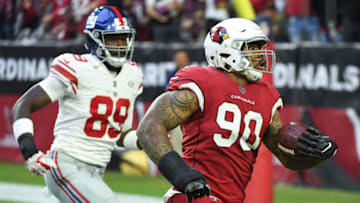 GLENDALE, AZ - DECEMBER 24: Defensive tackle Robert Nkemdiche #90 of the Arizona Cardinals runs in a 21 yard fumble recovery touchdown in front of tight end Jerell Adams #89 of the New York Giants in the second half at University of Phoenix Stadium on December 24, 2017 in Glendale, Arizona. (Photo by Norm Hall/Getty Images)