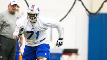 ORCHARD PARK, NY - May 18: Cyrus Kouandjio #71 of Buffalo Bills takes part in drills during the Buffalo Bills rookie minicamp on May 18, 2014 at Ralph Wilson Stadium in Orchard Park, New York. (Photo by Brett Carlsen/Getty Images)