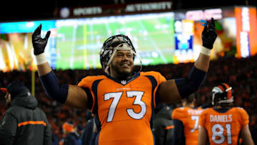 DENVER, CO - JANUARY 17: Max Garcia #73 of the Denver Broncos begins to celebrate and tries to get the crowd to get loud in the fourth quarter during the AFC Divisional Playoff Game against the Pittsburgh Steelers at Sports Authority Field at Mile High on January 17, 2016 in Denver, Colorado. (Photo by Dustin Bradford/Getty Images)