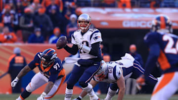 DENVER, CO - DECEMBER 18: Quarterback Tom Brady