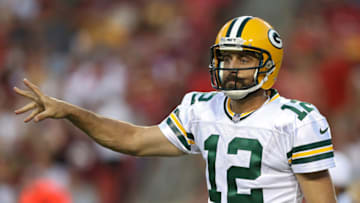 LANDOVER, MD - AUGUST 19: Quarterback Aaron Rodgers #12 of the Green Bay Packers signals a play against the Washington Redskins in the first half during a preseason game at FedExField on August 19, 2017 in Landover, Maryland. (Photo by Patrick Smith/Getty Images)