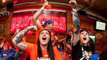DENVER, CO - FEBRUARY 7: Denver Broncos fans watch Super Bowl 50 at It's Brothers, a bar in Lower Downtown on February 7, 2016 in Denver, Colorado. (Photo by Dustin Bradford/Getty Images)
