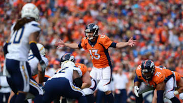 DENVER, CO - OCTOBER 30: Quarterback Trevor Siemian #13 of the Denver Broncos shouts out a play at the line of scrimmage in the first quarter of the game against the San Diego Chargers at Sports Authority Field at Mile High on October 30, 2016 in Denver, Colorado. (Photo by Dustin Bradford/Getty Images)