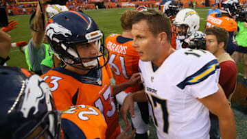 DENVER, CO - OCTOBER 30: Quarterback Philip Rivers #17 of the San Diego Chargers shakes hands with quarterback Trevor Siemian #13 of the Denver Broncos after the Broncos' 27-19 win at Sports Authority Field at Mile High on October 30, 2016 in Denver, Colorado. (Photo by Justin Edmonds/Getty Images)