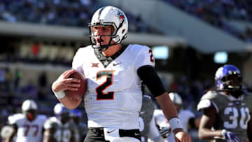 FORT WORTH, TX - NOVEMBER 19: Mason Rudolph #2 of the Oklahoma State Cowboys celebrates after scoring a touchdown against the TCU Horned Frogs in the second half at Amon G. Carter Stadium on November 19, 2016 in Fort Worth, Texas. (Photo by Tom Pennington/Getty Images)