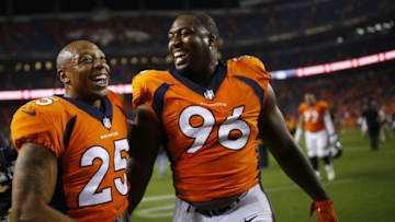 DENVER, CO - SEPTEMBER 11: Defensive end Shelby Harris #96 of the Denver Broncos celebrates winning the game with Chris Harris #25 against the Los Angeles Chargers at Sports Authority Field at Mile High on September 11, 2017 in Denver, Colorado. Harris blocked the game-tying field goal in the fourth quarter. (Photo by Justin Edmonds/Getty Images)