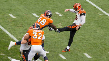 DENVER, CO - NOVEMBER 19: Outside linebacker Shaquil Barrett #48 of the Denver Broncos blocks a punt by punter Kevin Huber #10 of the Cincinnati Bengals in the first quarter of a game at Sports Authority Field at Mile High on November 19, 2017 in Denver, Colorado. (Photo by Justin Edmonds/Getty Images)