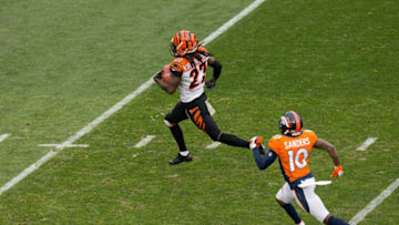 DENVER, CO - NOVEMBER 19: Cornerback Dre Kirkpatrick #27 of the Cincinnati Bengals runs for an 87 yard return and is chased down by wide receiver Emmanuel Sanders #10 of the Denver Broncos after intercepting a pass in the first quarter of a game at Sports Authority Field at Mile High on November 19, 2017 in Denver, Colorado. (Photo by Justin Edmonds/Getty Images)