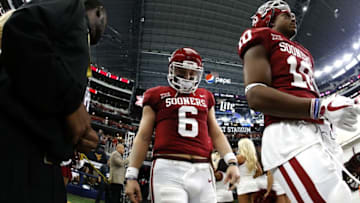 ARLINGTON, TX - DECEMBER 2: Baker Mayfield #6 of the Oklahoma Sooners takes the field with teammates before playing the TCU Horned Frogs during the first half at AT&T Stadium on December 2, 2017 in Arlington, Texas. OU won 41-17. (Photo by Ron Jenkins/Getty Images)