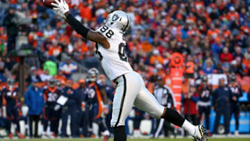DENVER, CO - DECEMBER 13: Tight end Clive Walford #88 of the Oakland Raiders makes a catch against the Denver Broncos at Sports Authority Field at Mile High on December 13, 2015 in Denver, Colorado. (Photo by Doug Pensinger/Getty Images)